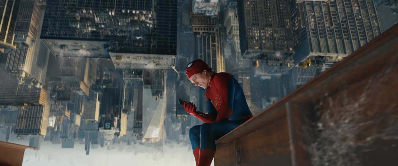 default-447 man in spiderman outfit sits atop a skyscraper looking at his phone , the backround is upside down.